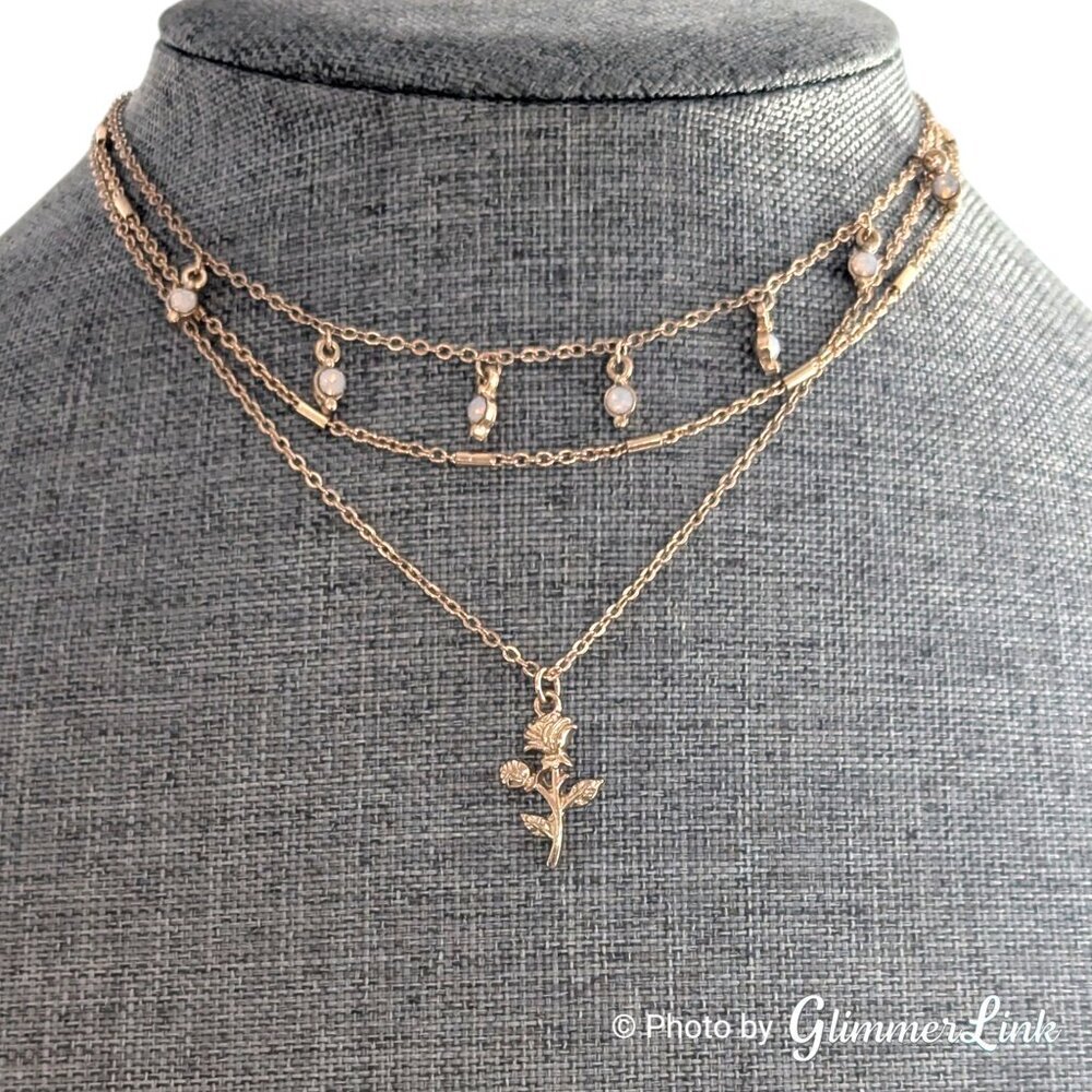 Gold Tone Triple Strand Necklace with Rose Pendant and Opalescent Rhinestones